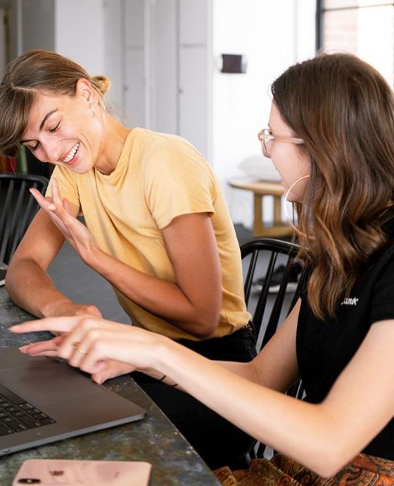 Two women laughing