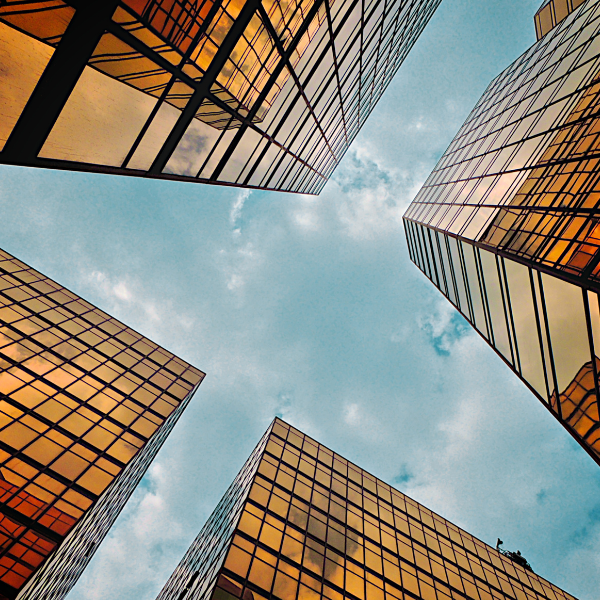 Orange skyscrapers in front of blue sky